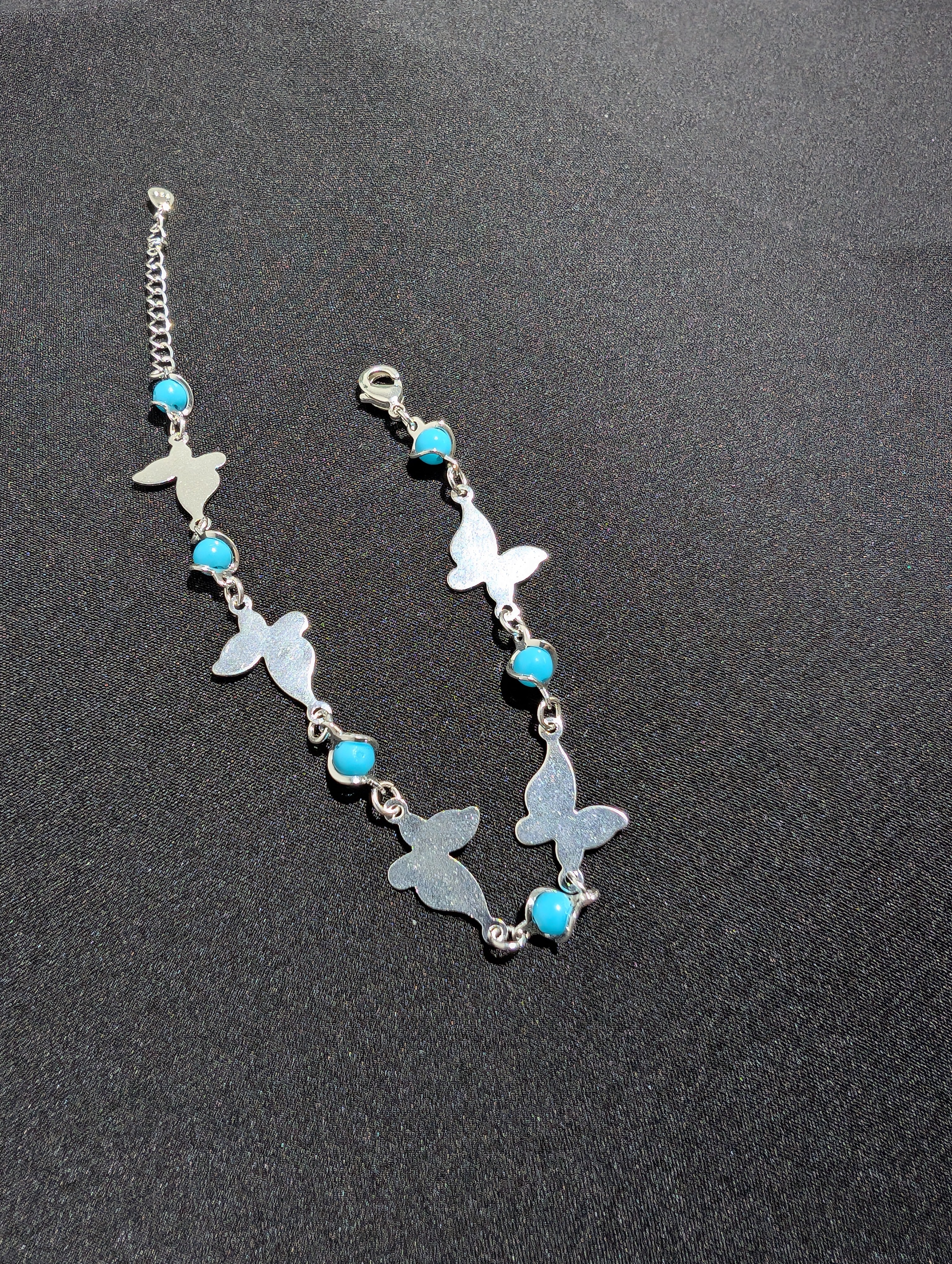 Pulsera Mariposas plata con puntos azules